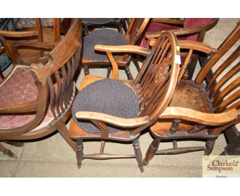 An elm seated stick back Windsor type elbow chair 
