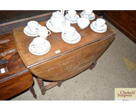 An oak gate leg dining table