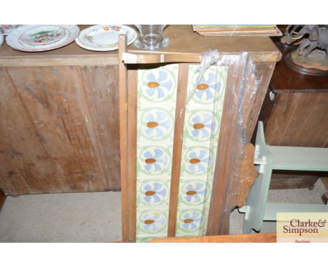 An Edwardian tile back washstand top