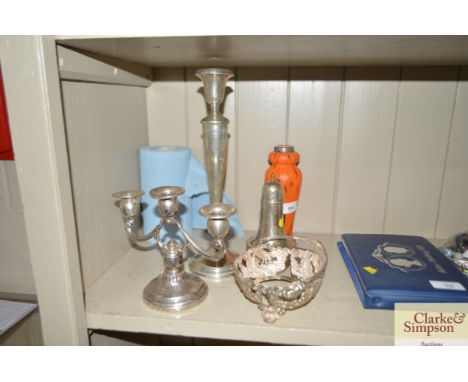 An American Sterling three light candelabra; a similar candlestick; white metal Rococo style sugar bowl frame, silver baluste