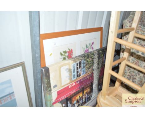 A framed and glazed six section embroidery; and a French style print on canvas 
