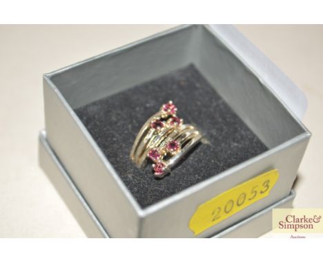 An Indian ruby and white metal ring