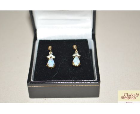 A pair of opal and diamond drop ear-rings 