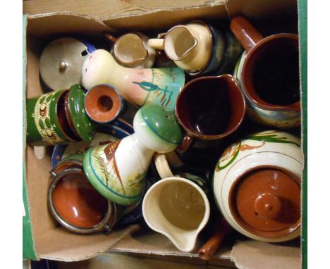 A box containing a quantity of Torquay pottery including Aller Vale mug, a Watcombe apple blossom pot, etc.