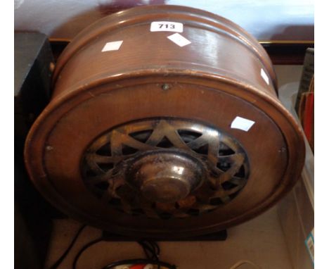 A wood and metal circular radio speaker with plaque to base 'Marconiphone Model No 105'