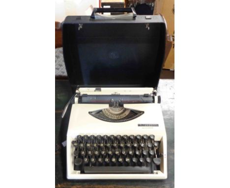 A cased Adler Tippa typewriter