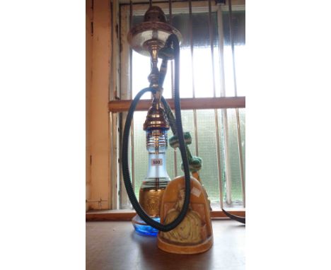 A Shisha hookah pipe with green binding and chrome top - sold with ceramic figure of seated lady
