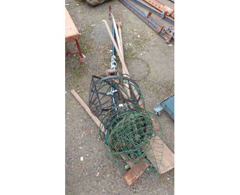 A quantity of flower baskets - sold with a quantity of garden tools