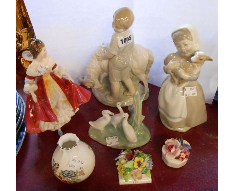 A Royal Doulton figurine Southern Bell HN 2229 - sold with three Nao figurines, etc.