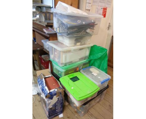 Seven crates containing a large selection of Christmas decorations including lights, light up villages, baubles, etc.