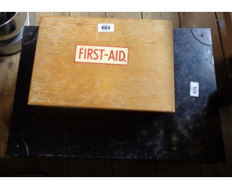 A vintage wooden first aid box - sold with a small black metal trunk