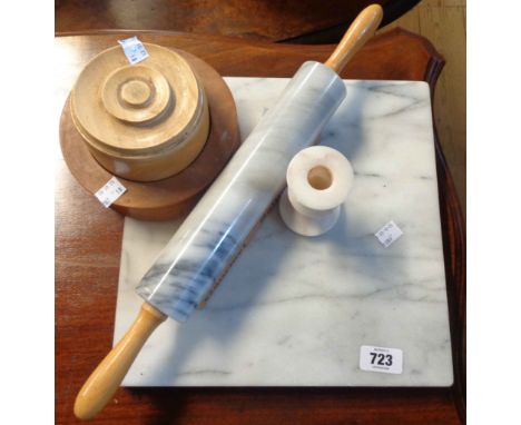 A marble chopping board and similar rolling pin, etc.