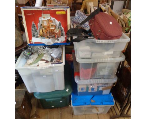 Six crates containing a large quantity of assorted Christmas decorations including light up tree, baubles, light up house, et