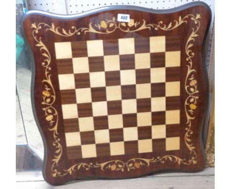 A Sorrento ware chess table set on screw-on legs