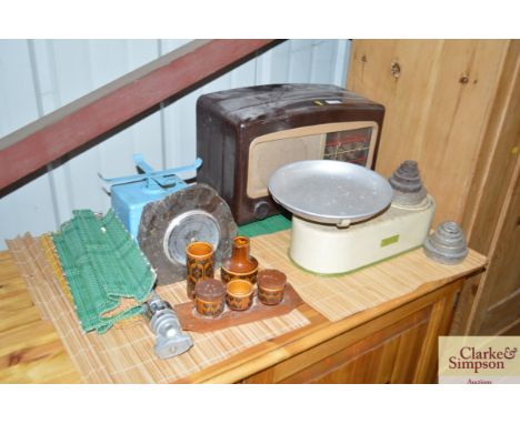 A Bakelite radio; a set of Harper kitchen scales; and various other items