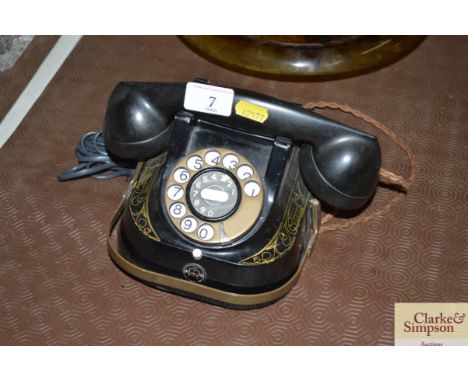 A FTR ]rotary dial telephone 