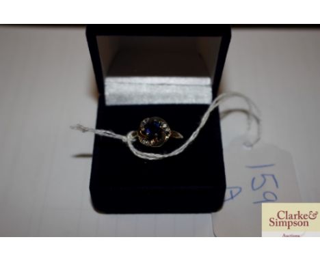 A boxed .925 and sapphire set ring 