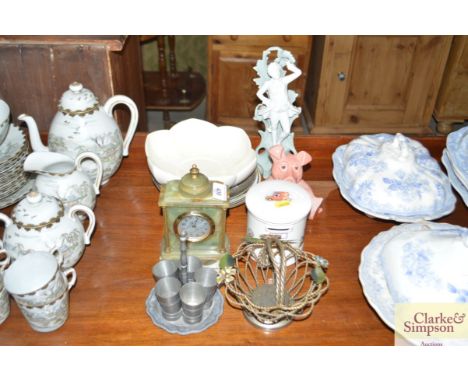 An onyx mantel clock; a pig money bank; porcelain figure etc.