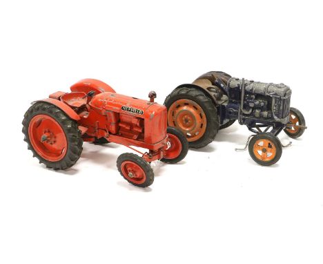 Denzil Skinner Nuffield Tractor together with a Chad Valley Fordson tractor (both F, incomplete) (2)