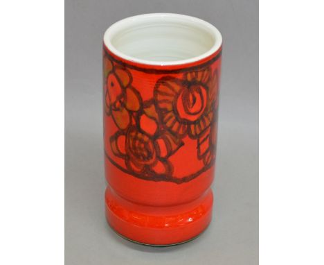 Poole Pottery cylindrical vase, with dolphin stamp and '84' to base. Height 23cm.