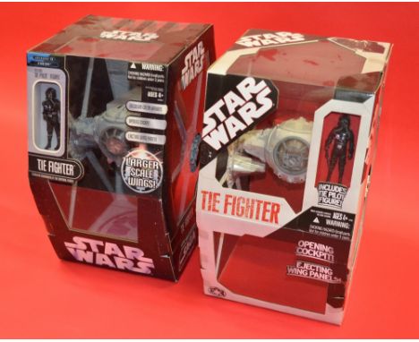 Two Hasbro Star Wars TIE Fighter models - each with TIE Pilot figure. Both boxed. (2)