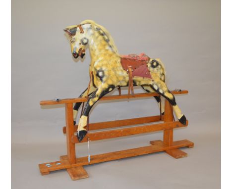 An early 20th century Collingston wooden rocking horse, needs restoration [COLLECTION ONLY]