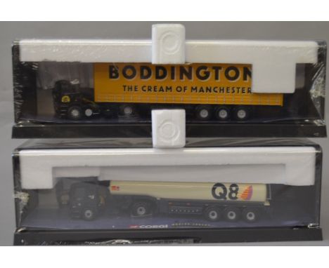 2 Corgi Modern Truck models in plastic display cases with polystyrene.