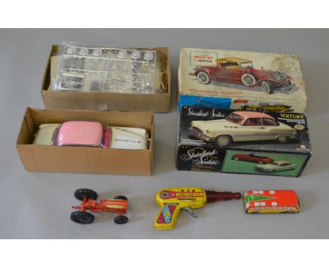 Hubley 1930 Packard Roadster metal kit, appears complete but not checked. Together with a friction powered Standard Sedan and