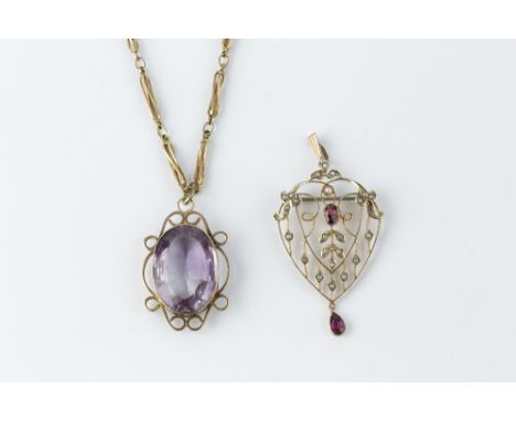 AN AMETHYST PENDANT NECKLACE, the oval mixed-cut amethyst in scrolled pendant mount, suspended from a 9ct gold fancy baton-li