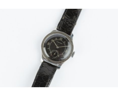 A GENTLEMAN'S WRISTWATCH BY LONGINES, the circular black dial with alternate silvered Arabic numerals, baton markers and subs