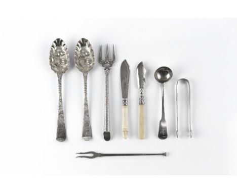 TWO 18TH CENTURY IRISH SILVER TABLESPOONS, later embossed as berry spoons; a George III Irish silver fiddle pattern sauce lad