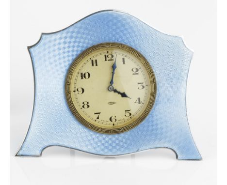 A SILVER AND SKY BLUE ENAMEL EASEL TIMEPIECE, of shaped outline, with circular dial, by Adie Bros Ltd, Birmingham 1929, 9.5cm