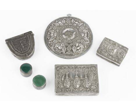 A COLLECTION OF EASTERN WHITE METAL ITEMS, including a circular mirror embossed with angel figures, two rectangular boxes, a 