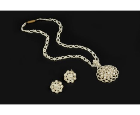 A COLLECTION OF 19TH CENTURY AND LATER SEED PEARL JEWELLERY, comprising a seed pearl flowerhead pendant, suspended from a see