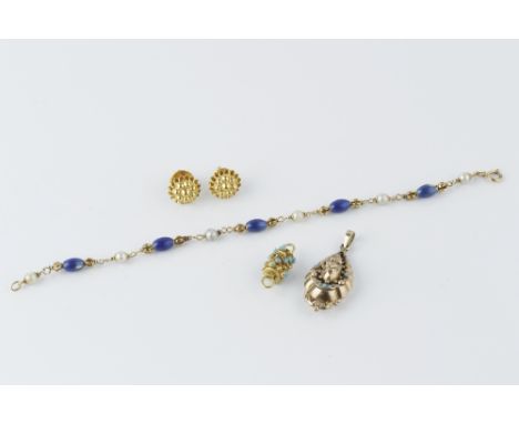AN ENAMEL AND CULTURED PEARL BRACELET BY UNOAERRE, comprising a line of blue enamel ovoid beads, spaced by cage work links an