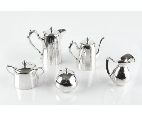 A PERUVIAN SILVER THREE PIECE TEA SERVICE comprising teapot, hot water pot and sucrier, together with another similar sucrier