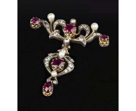 A LATE 19TH/EARLY 20TH CENTURY RUBY, DIAMOND AND PEARL BROOCH, the openwork panel of foliate scroll design, highlighted with 