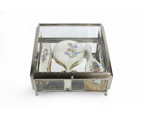 A SILVER PLATED SQUARE SECTION DISPLAY CASE, with bevelled glass top and sides, and mirrored base, on shaped feet, 26.5cm wid