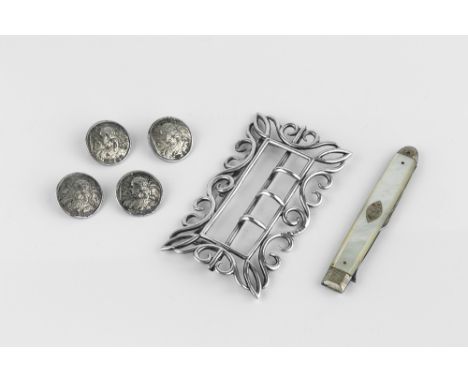 A VICTORIAN SILVER BELT BUCKLE, of scroll pierced rectangular outline, by Lawrence Emanuel, Birmingham 1876, 9cm wide; a set 