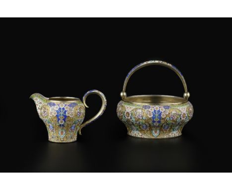 A RUSSIAN SILVER GILT AND CLOISONNÉ ENAMEL SWING HANDLED SUGAR BASIN AND CREAM JUG, Moscow 11th Artel, circa 1908-1917, 88 Zo