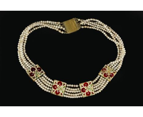 AN INDIAN COLLAR NECKLACE, designed as four rectangular panels, each inset with a cluster of turquoise cabochons and heighten