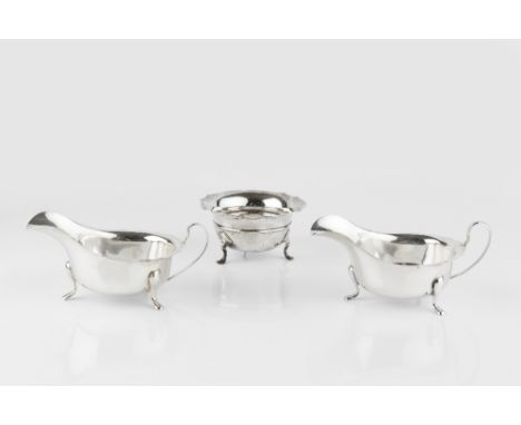 A MATCHED PAIR OF SILVER SAUCE BOATS, by Viner's Ltd, London 1934 and Sheffield 1955, 7 oz; a silver sugar basin, on pad feet