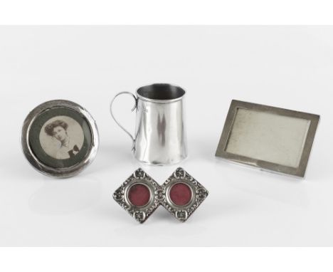 A COLLECTION OF SILVER, to include a christening cup, Sheffield 1937, a late Victorian miniature double photo frame, Chester 