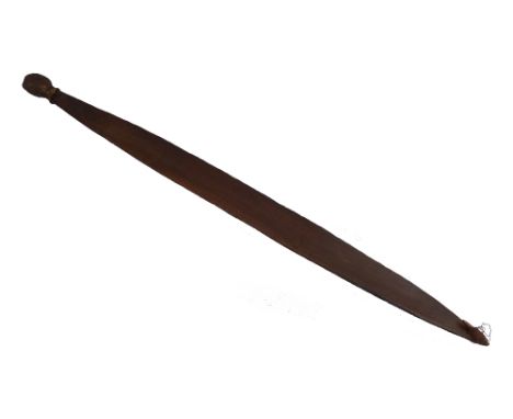 A 19th century Western Australian aboriginal woomera spear thrower, of typical leaf form with longitudinal fluting, fibre bou