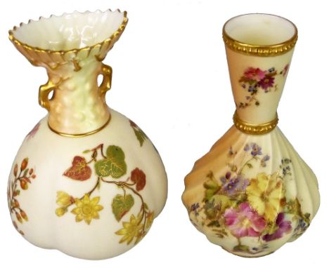 A late 19th century Royal Worcester vase, of bulbous quatrefoil form with shell rim, printed, painted and gilded with flowers