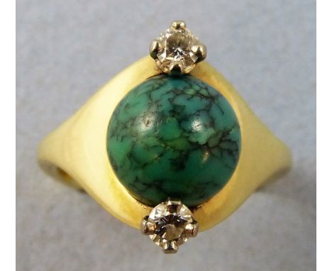 A German 14 k gold, turquoise and diamond dress ring stamped 585 and GA, set with a turquoise matrix bead, flanked by brillia