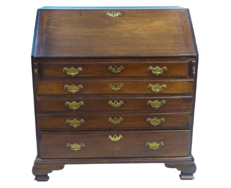 A George III mahogany bureau, the fall front opening to reveal a fitted interior with inset writing surface and central cupbo