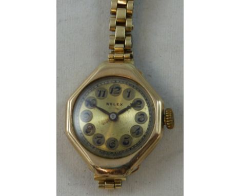 Rolex - a 9 rose ct gold lady's manual wind wristwatch, Glasgow 1924, case number 4543, the gilt dial to an octagonal case.