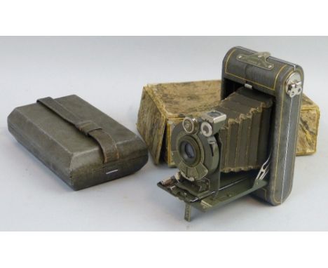 A Kodak Vanity Vest Pocket series III camera, in grey, with Kodak f/6.3 lens, serial number 94419, case and marbled cardboard