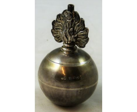 An Edwardian silver Royal Grenadiers and Fusilier's table lighter, Birmingham 1907, in the form of a grenade, the plain spher